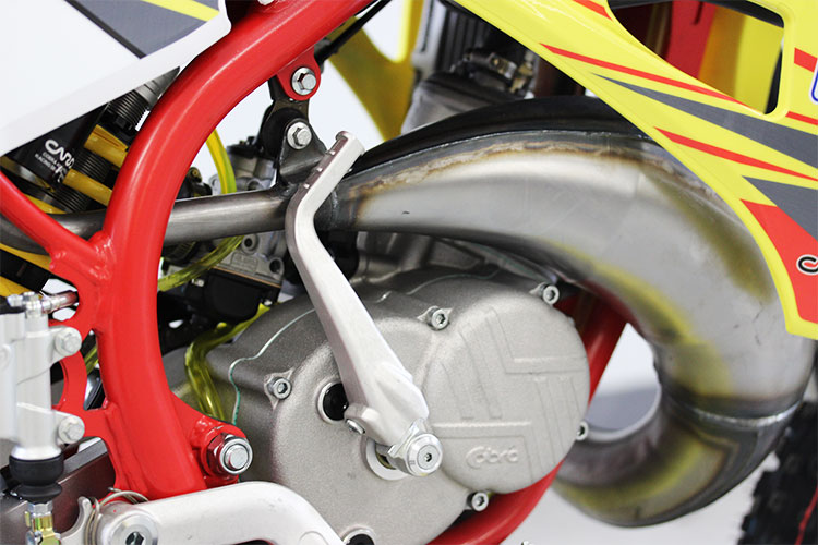 The kick-starting is a normal direction kick to ease the pain of getting the bike running.