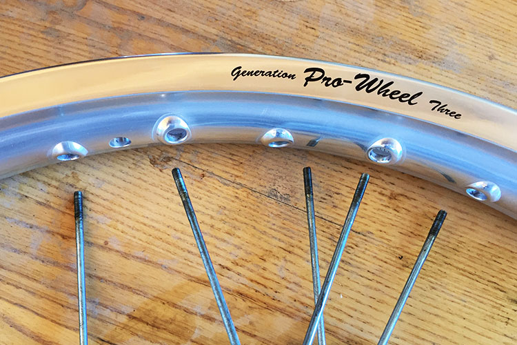 When you put the new rim on pay close attention to the orientation of the nipple holes. They are directional in both which direction they are facing and also to which side the spoke comes in from. 